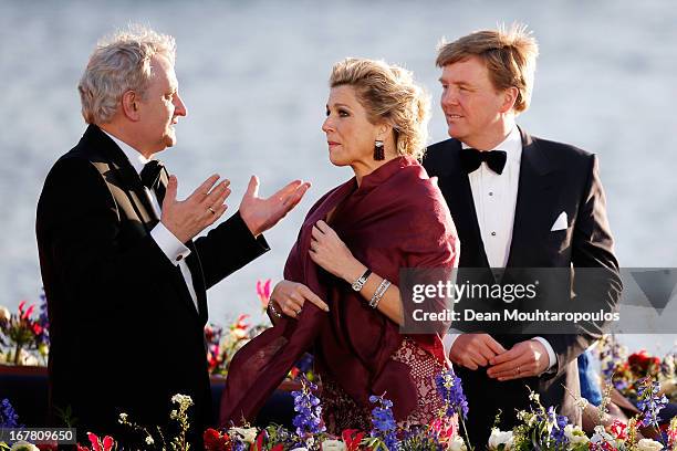 Eberhard E. Van der Laan , Mayor of Amsterdam speaks to King Willem Alexander and Queen Maxima of the Netherlands aboard the King's boat for the...