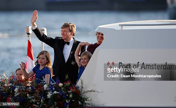 King Willem Alexander, Queen Maxima and their daughters Princess Catharina Amalia, Princess Ariane and Princess Alexia of the Netherlands wave to the...