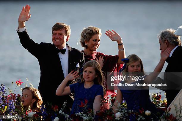 King Willem Alexander, Queen Maxima and their daughters Princess Catharina Amalia, Princess Ariane and Princess Alexia of the Netherlands wave to the...