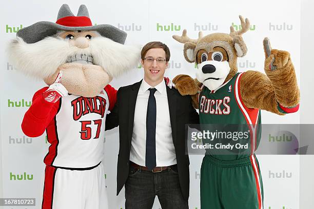 Josh Greenbaum with mascots Hey Reb! and Bango the Buck attend Hulu NY Press Junket on April 30, 2013 in New York City.