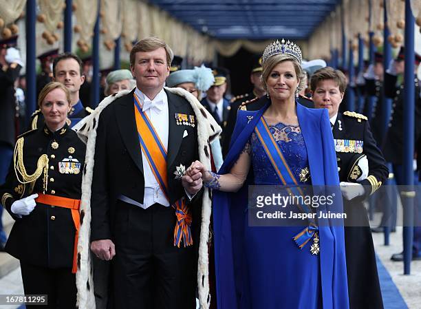 King Willem-Alexander of the Netherlands and Queen Maxima of the Netherlands leave after the inauguration ceremony of King Willem Alexander of the...