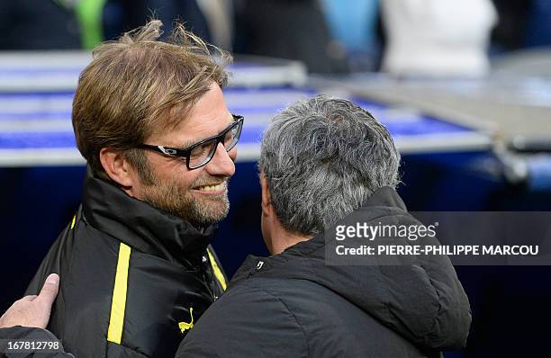 Dortmund's head coach Juergen Klopp greets Real Madrid's Portuguese coach Jose Mourinho during the UEFA Champions League semi-final second leg...