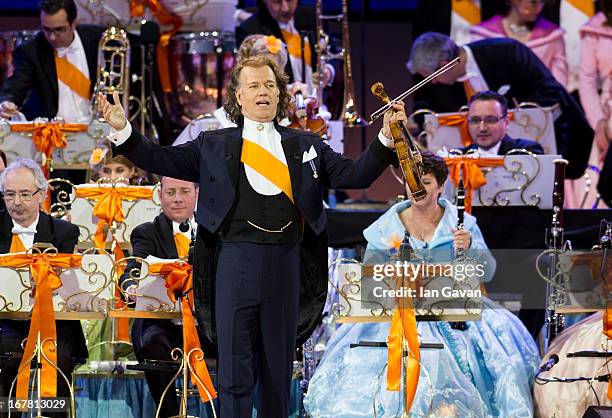 Andre Rieu performs on stage at Museumplien during the inauguration of King Willem Alexander of the Netherlands as Queen Beatrix of the Netherlands...