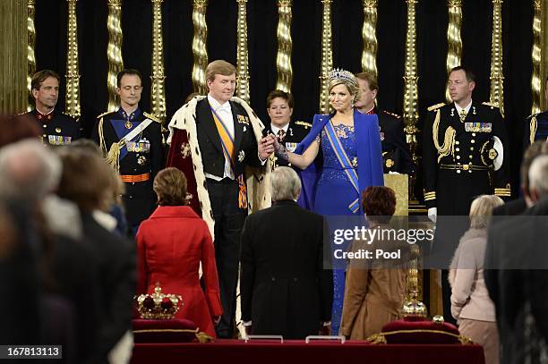 King Willem-Alexander of the Netherlands alongside HM Queen Maxima of the Netherlands during his swearing in and investiture ceremony in front of the...