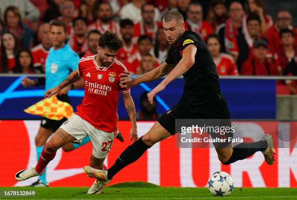 Strahinja Pavlovic of FC Salzburg with Rafa Silva of SL Benfica in action during the Group D - UEFA Champions League 2023/24 match between SL Benfica...