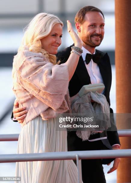 Crown Princess Mette-Marit of Norway and Crown Prince Haakon arrive at the Muziekbouw following the water pageant after the abdication of Queen...