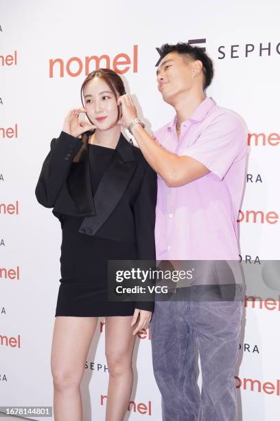 Actor Tony Yang and his wife Melinda Wang attend Sephora commercial event on September 13, 2023 in Hong Kong, China.