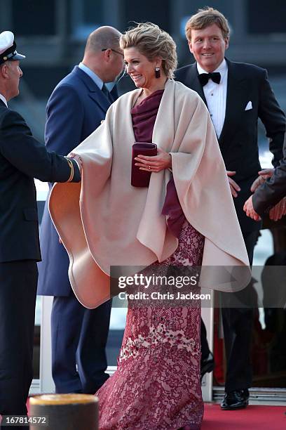 Queen Maxima and King Willem Alexander of The Netherlands arrive at the Muziekbouw following the water pageant after the abdication of Queen Beatrix...