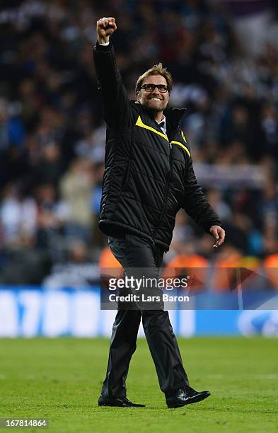 Head Coach Jurgen Klopp of Borussia Dortmund celebrates as his team reach the final after the UEFA Champions League Semi Final Second Leg match...