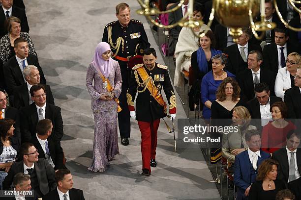 Crown Prince Al-Muhtadee Billah and Princess Sarah of Brunei enter the church to attend the inauguration of HM King Willem-Alexander of the...