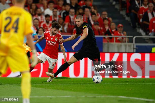 Rafa Silva of SL Benfica, Strahinja Pavlovic of FC Salzburg battle for the ball during the UEFA Champions League match between SL Benfica and FC...