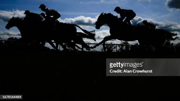 General view as runners race down the back straight at Bath Racecourse on September 13, 2023 in Bath, England.