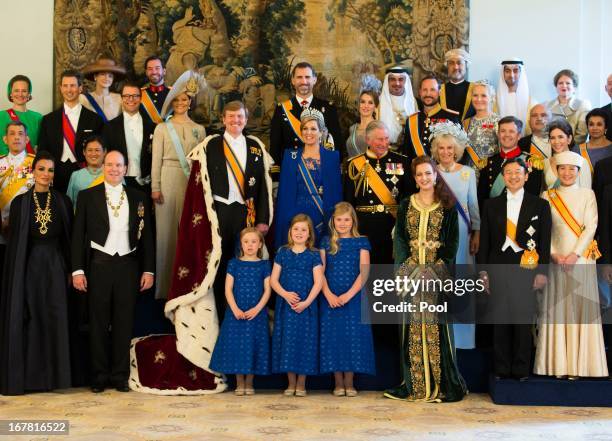 King Willem Alexander and Queen Maxima of the Netherlands pose with guests following their inauguration ceremony, at the Royal Palace on April 30,...
