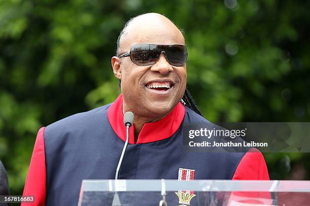 Stevie Wonder attends the ceremony honoring "Shotgun Tom" Kelly with a star on The Hollywood Walk of Fame held on April 30, 2013 in Hollywood,...