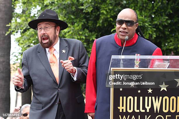 Shotgun Tom" Kelly and Stevie Wonder attend the ceremony honoring "Shotgun Tom" Kelly with a star on The Hollywood Walk of Fame held on April 30,...