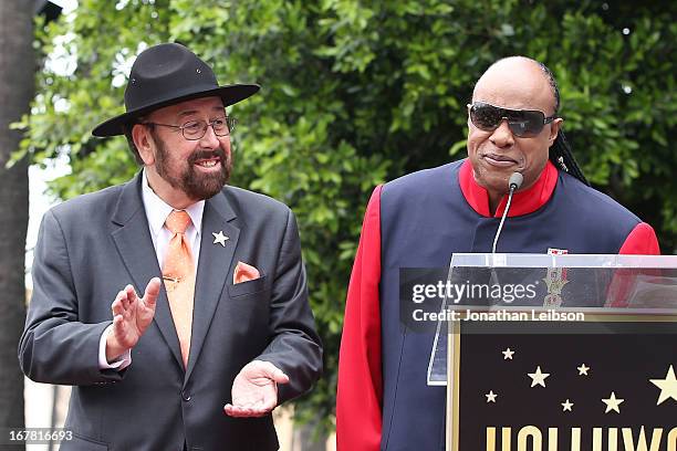 Shotgun Tom" Kelly and Stevie Wonder attend the ceremony honoring "Shotgun Tom" Kelly with a star on The Hollywood Walk of Fame held on April 30,...