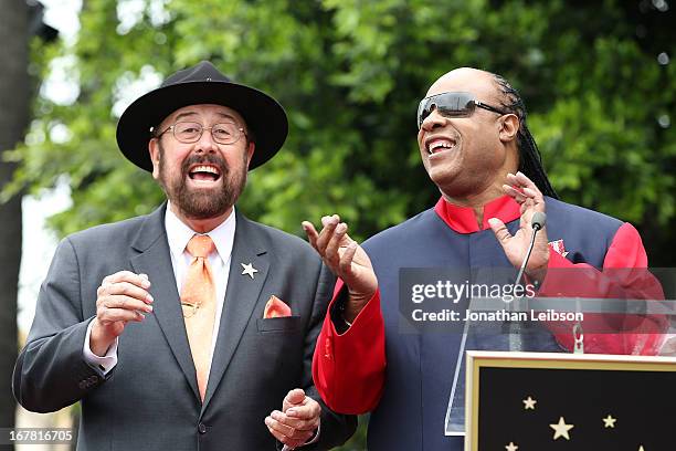 Shotgun Tom" Kelly and Stevie Wonder attend the ceremony honoring "Shotgun Tom" Kelly with a star on The Hollywood Walk of Fame held on April 30,...