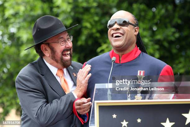 Shotgun Tom" Kelly and Stevie Wonder attend the ceremony honoring "Shotgun Tom" Kelly with a star on The Hollywood Walk of Fame held on April 30,...