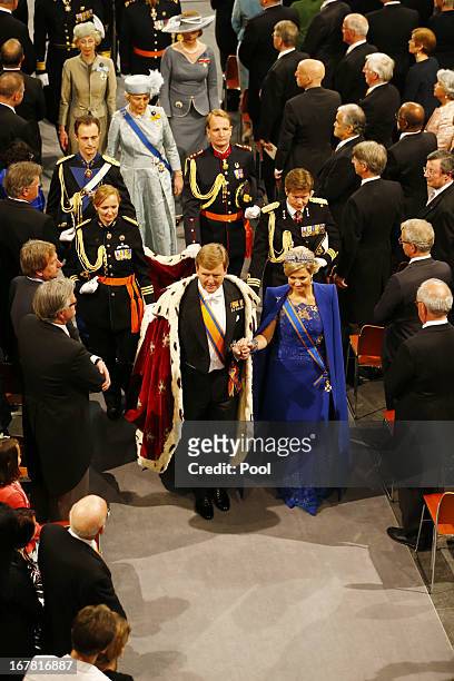 King Willem Alexander of the Netherlands and Queen Maxima of the Netherlands leave after attending the inauguration of King Willem-Alexander in front...