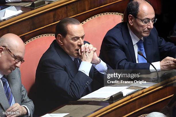 Former Minister of the Culture Sandro Bondi, Silvio Berlusconi and former president of the Senate Renato Schifani attend the confidence vote at the...