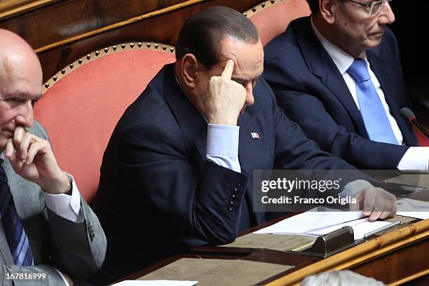 Former Minister of the Culture Sandro Bondi, Silvio Berlusconi and former president of the Senate Renato Schifani attend the confidence vote at the...