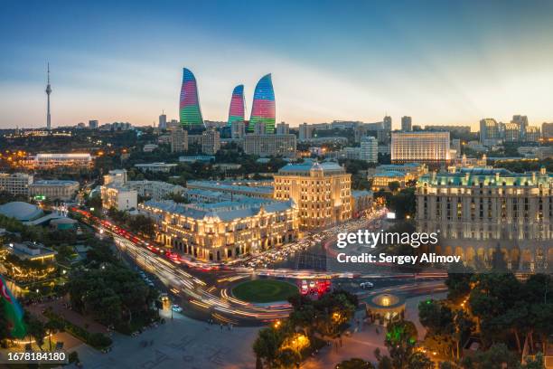 beautiful long exposure cityscape of baku at sunset - azerbaijan stock pictures, royalty-free photos & images