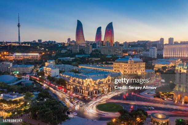 aerial downtown baku skyline at night, azerbaijan - baku skyline stock pictures, royalty-free photos & images