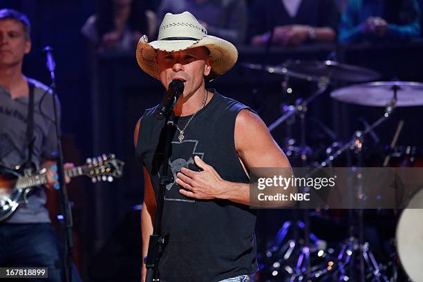 Episode 825 -- Pictured: Musical guest Kenny Chesney performs on April 30, 2013 --