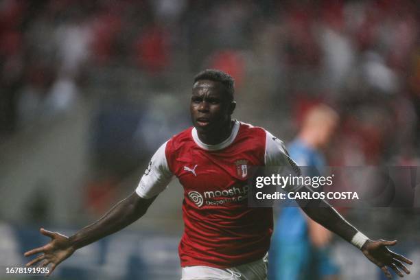Sporting Braga's Portuguese forward Bruma celebrates scoring his team's first goal during the UEFA Champions League 1st round day 1 group C football...