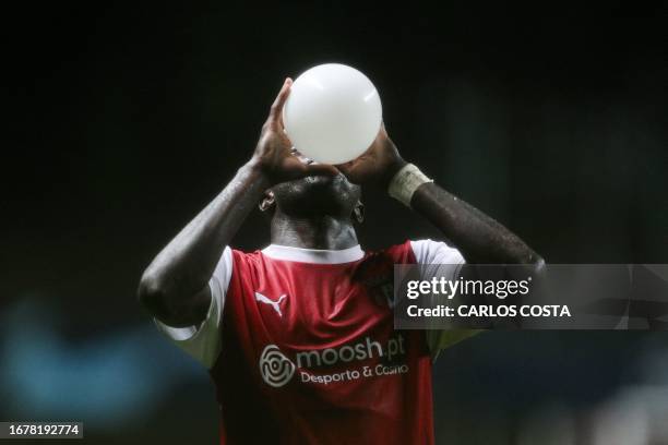 Sporting Braga's Portuguese forward Bruma celebrates scoring his team's first goal during the UEFA Champions League 1st round day 1 group C football...