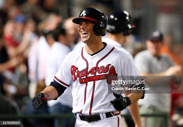 Tim Hudson of the Atlanta Braves reacts after hitting a solo homer in the fifth inning against the Washington Nationals at Turner Field on April 30,...