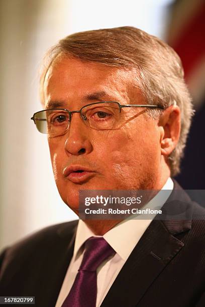 Treasurer Wayne Swan talks to the media at a press conference at the Commonwealth Parliamentary Office on May 1, 2013 in Melbourne, Australia....