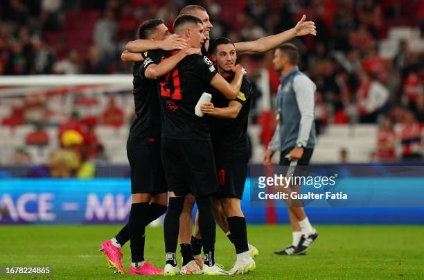 Goal scorer Oscar Gloukh of FC Salzburg celebrates the victory with teammates at the end of the Group D - UEFA Champions League 2023/24 match between...