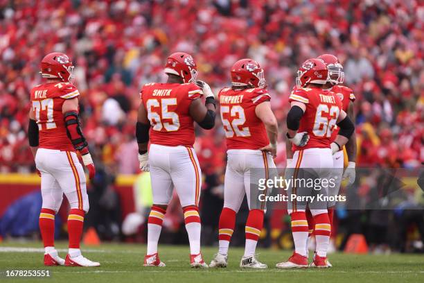 The Kansas City Chiefs offense stands on the field during an AFC Divisional Round playoff game against the Jacksonville Jaguars at GEHA Field at...
