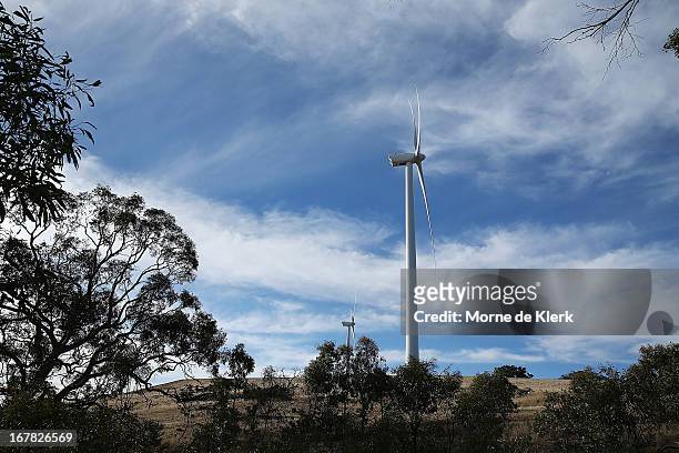 Wind turbines are seen on a hill on April 18, 2013 in Waterloo, Australia. South Australia's Environmental Protection Agency in conjunction with the...