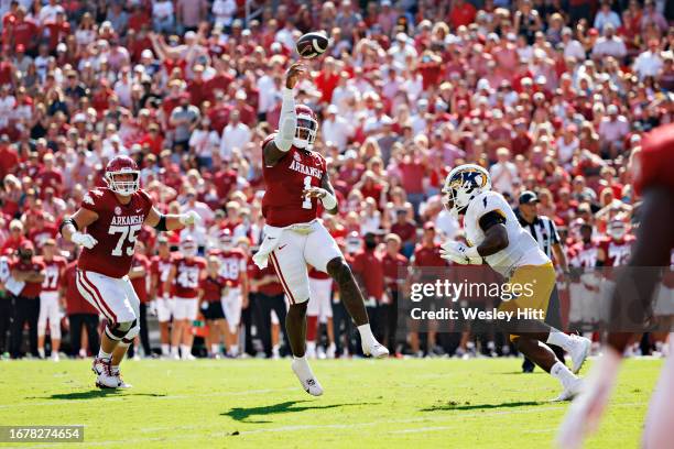 Jefferson of the Arkansas Razorbacks throws a pass during the game against the Kent State Golden Flashes at Donald W. Reynolds Razorback Stadium on...