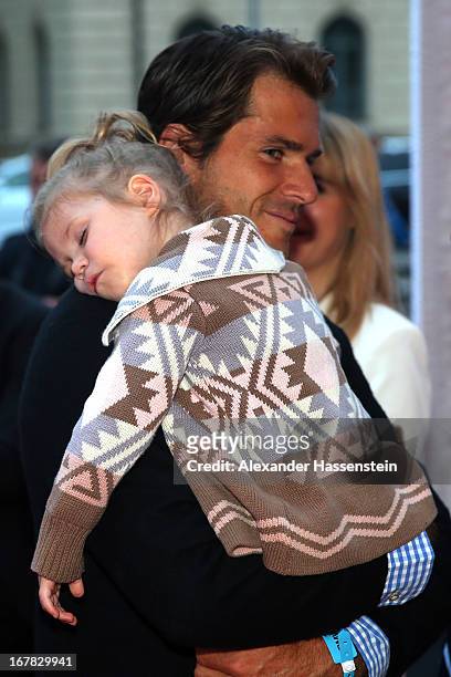 Tommy Haas arrives with his daughter Valentina for the BMW Open Players Night at Lazy Moon Dinner Club on April 30, 2013 in Munich, Germany.