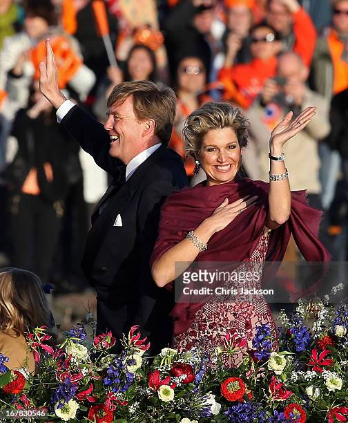 King Willem Alexander and Queen Maxima are seen aboard the King?s boat for the water pageant to celebrate the inauguration of King Willem of the...