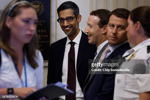 Google CEO Sundar Pichai and Meta CEO Mark Zuckerberg visit before attending the "AI Insight Forum" outside the Kennedy Caucus Room in the Russell...