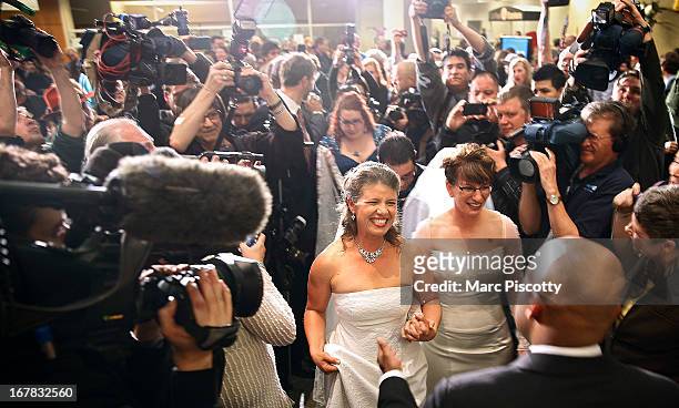 Anna and Fran Simon, both of Denver, Colorado, are the first same-sex couple to be issued a Civil Union license at a midnight ceremony in the Denver...