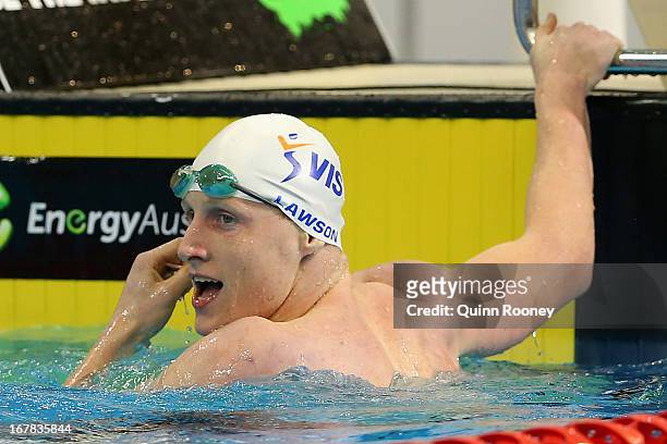 Matson Lawson of Australia checks his time after winning the Men's 200 Metre Backstroke during day six of the Australian Swimming Championships at SA...