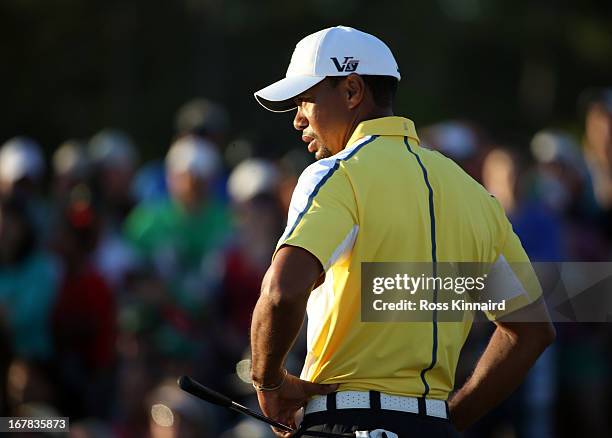 Tiger Woods of the USA on the 18th green during the second round of the 2013 Masters at the Augusta National Golf Club on April 12, 2013 in Augusta,...