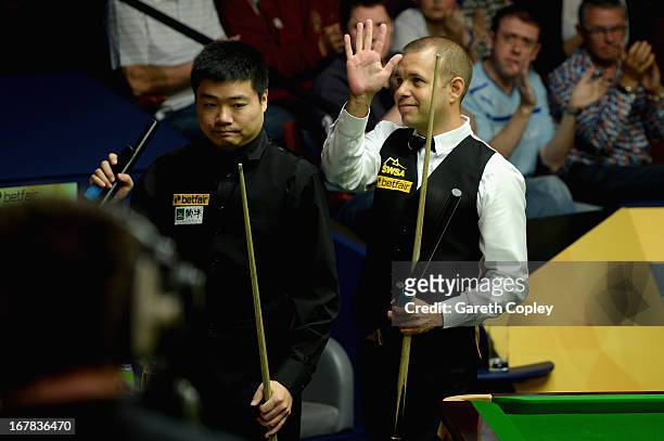 Barry Hawkins celebrates beating Ding Junhui during their Quarter Final match in the Betfair World Snooker Championship at the Crucible Theatre on...