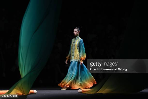 Model walks the runway at the LOOLAYY by Zhang Xiaoqi show at the China Fashion Week S/S 2024 on September 13, 2023 in Beijing, China.