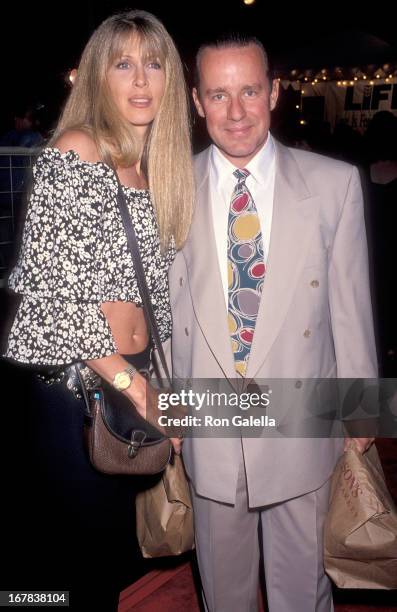 Actor Phil Hartman and wife Brynn attend the Fifth Annual Project Robin Hood Food Drive to Benefit Love Is Feeding Everyone on June 26, 1993 at...