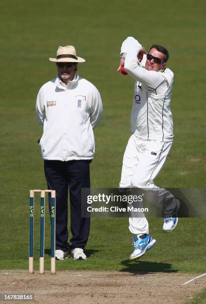 Graeme Swann of Nottinghamshire in action bowling during day three of the LV County Championship division one match between Nottinghamshire and...