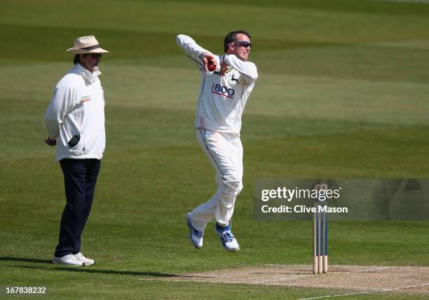 Graeme Swann of Nottinghamshire in action bowling during day three of the LV County Championship division one match between Nottinghamshire and...