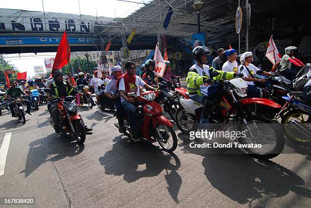 Labor groups and trade unions march near the presidential palace on May 1, 2013 in Manila, Philippines. The Philippines workers unions gather in the...