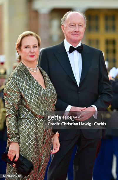 Laurence de Gaulle and Yves de Gaulle arrive ahead of a state dinner at the Palace of Versailles on September 20, 2023 in Versailles, France. The...
