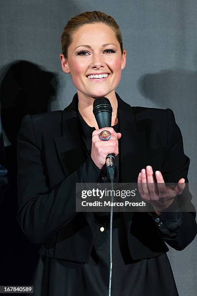 German singer Helene Fischer attends the premiere of the documentary 'Allein im Licht' at the Babylon cinema on April 30, 2013 in Berlin, Germany.